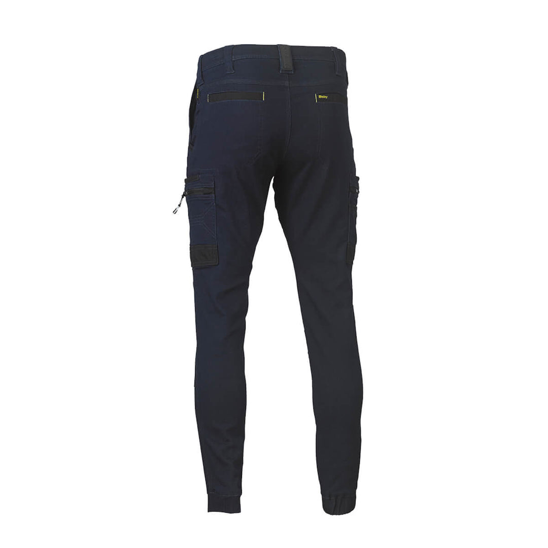 Dark Denim Bisley BPC6335 work pants with multiple pockets on a white background - back view